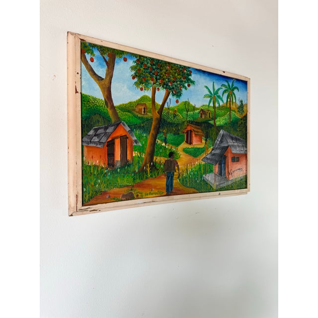 A vibrant and detailed 1970s vintage oil on canvas painting by Haitian folk artist F. Faramon. This expressive piece...