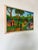 A vibrant and detailed 1970s vintage oil on canvas painting by Haitian folk artist F. Faramon. This expressive piece...