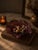 A stunning vintage amethyst plum art glass ruffled bowl in the style most associated with the beloved Fenton Art Glass...