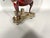 A charming mid-20th-century Dutch Edeltin faucet pitcher set, consisting of a hand-painted lacquered tin pitcher and its...
