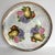 Here is a glamorous set of 8 plates with a matching platter. The plates feature the same fruit motif with a shiny, gold...