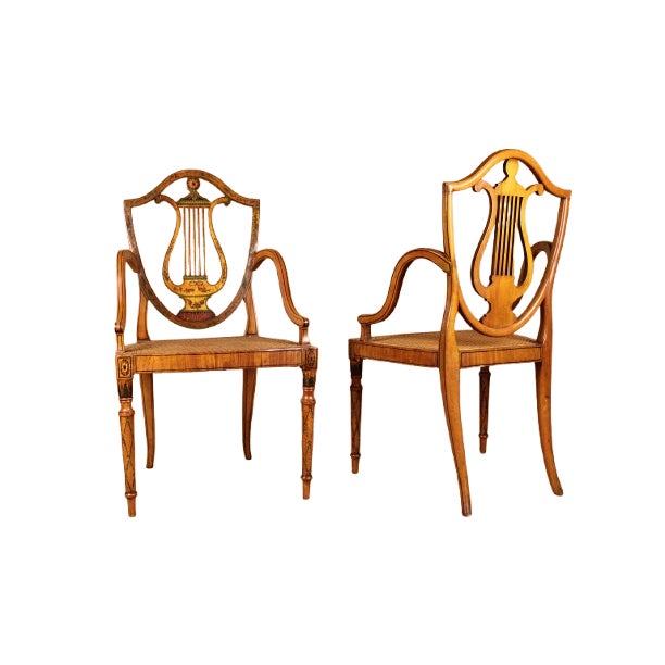 With cane seats. In excellent antique condition with minor wear to paint. H: 37" W: 27.75" D: 16.5" | Seat Height: 17"