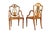 With cane seats. In excellent antique condition with minor wear to paint. H: 37" W: 27.75" D: 16.5" | Seat Height: 17"
