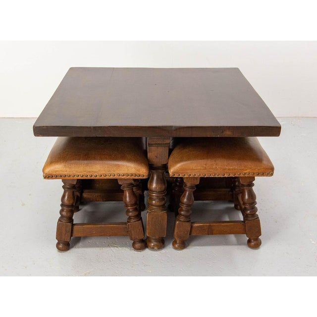 Square alder coffee table with its four littles leather and alder stools. Very good quality leather. Spain, midcentury...