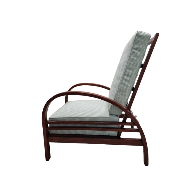 A unique and comfortable armchair from the early art deco period (1910-20's) featuring a revolutionary design of the time:...