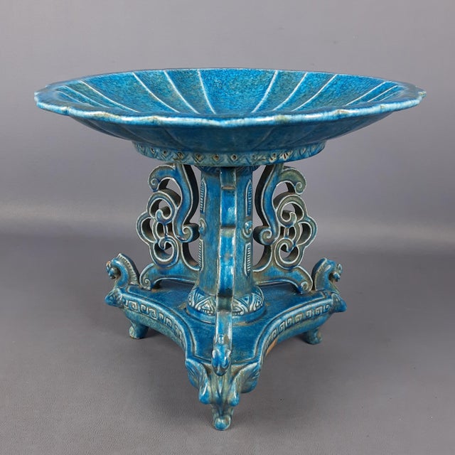 Highly charming and rare piece: an important majolica ceramic cake stand or centerpiece dating back to the 1950s. The...