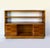 A distinctive 1930s italian art deco bookcase, entirely veneered in walnut. it features a simple, regular, and symmetrical...