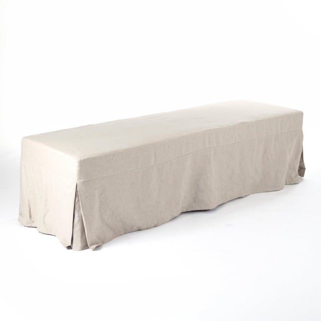 The Sadie Bench from Zentique is a French country upholstered bench in natural linen with a clean, low-profile silhouette....