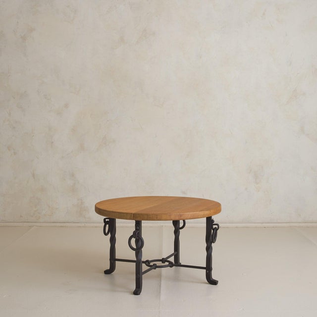 This 1950s Belgian coffee table is a study in material clarity, where solidity and movement are held in balance. The base...