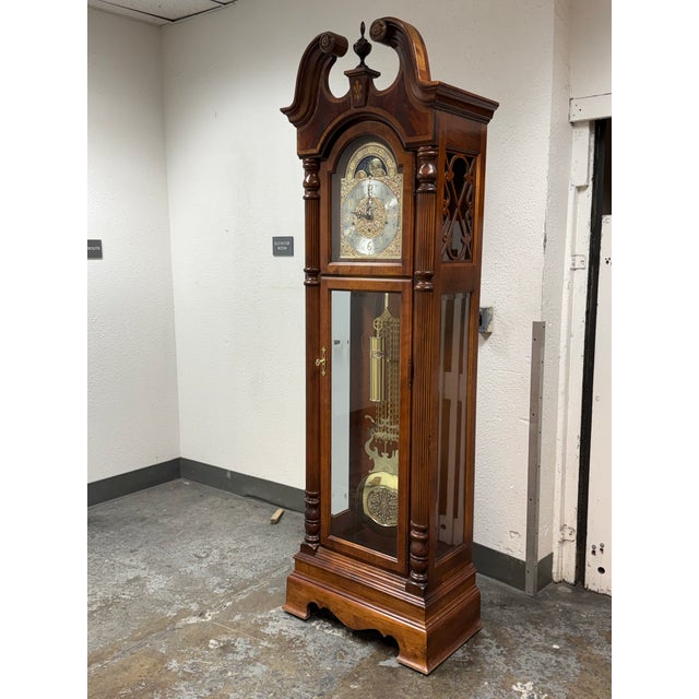 Design Plus Gallery presents a "Raymour" Grandfather Clock Model #610-811 from the Broadmour Collection by Howard Miller....