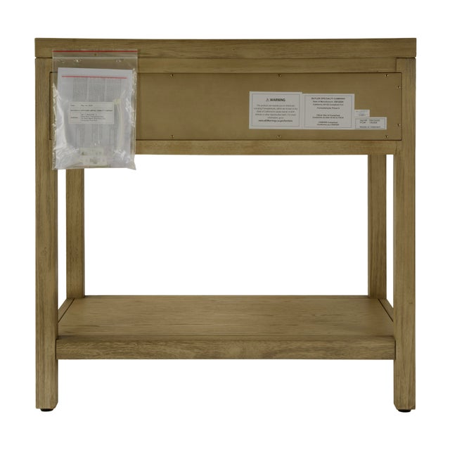 Enhance your bedroom or living space with the Butler Specialty Company Nora Wide Nightstand, a stylish blend of modern...