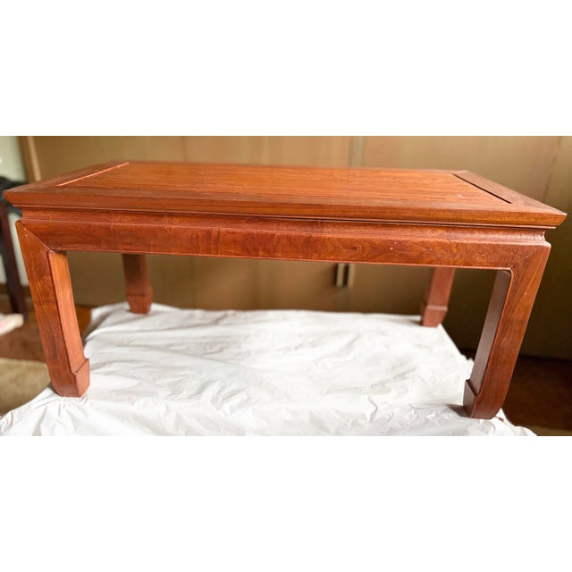This is a beautiful Natural Finish Vintage Chinese Rosewood Ming Style Rectangular Coffee Table, circa 1940. Very good...