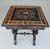Elegant Italian Neo-Renaissance work table from the late 19th century, executed in ebonized wood with finely detailed...