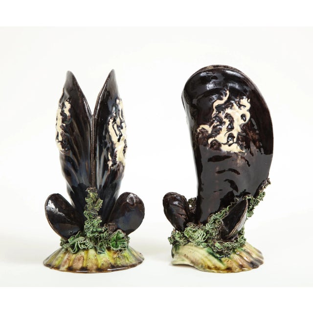 Unusually eccentric vases in the form of black mussel shells resting on a bed of seaweed and a scallop shell. Caldas da...