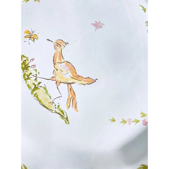 Old dish by Moustier. This Dish is in faience, and has been made in France, during the 19th Century. The colors are green...