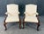 This pair of Baker Furniture Stately Homes Gainsborough arm chairs features elegant, hand-carved wood frames with graceful...