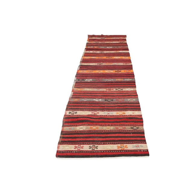 Vintage handwoven decorative kilim rug from Denizli region of Turkey. Approximately 50-60 years old. In very good condition.