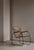 A charming Swedish garden armchair from the 1930s, featuring a sculptural tubular steel frame with aged green patina and...
