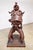 A figurative and imaginative carved sculpture in stack laminated black walnut circa 1960s. According to the family, the...