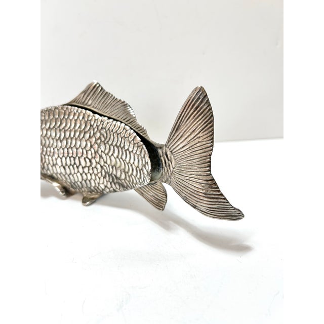 Sculptural vintage silver-plated figural fish menu or paper holder, finely cast with detailed scales, fins, and expressive...