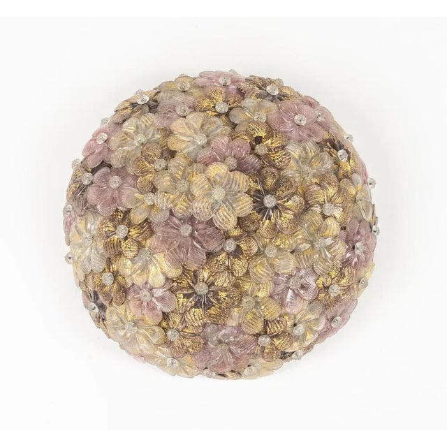 Midcentury amazing round wall lamp or ceiling light composed of lovely colorful murano glass flowers by Barovier & Toso....