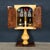 A distinctive and highly collectible bar cabinet by aldo tura, dating to the 1960s, exemplifying the designer’s signature...