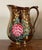 Antique 19th century English Regency Staffordshire copper luster pitcher. Decorated with relief molded pink roses. Useful...