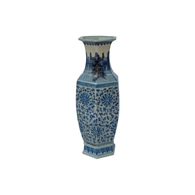 Introducing a captivating Chinese blue and white hexagonal flower graphic vase, an exquisite masterpiece that effortlessly...