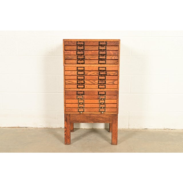 A rare antique Mission or Arts & Crafts 15-drawer flat file cabinet In the manner of Hamilton USA, Circa 1900 Oak, with...