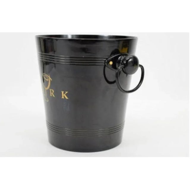 Very lovely black Cork thin aluminum ice bucket. Has 2 metal handles on side. Light weight In very good condition