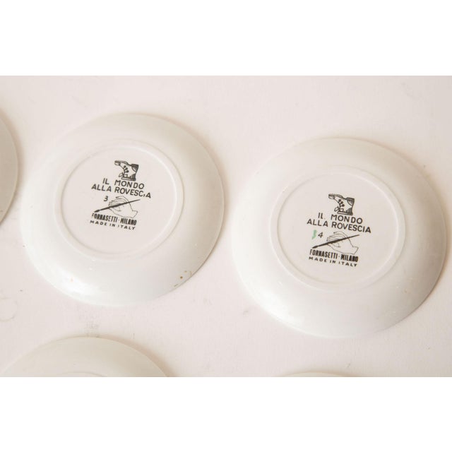 Vintage Piero Fornasetti Porcelain Colored Opera Coasters Il Mondo Alla Rovescia Set of 8 Italian MCM For Sale - Image 11 of 12
