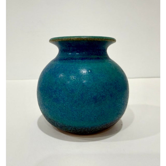 Beautiful handmade, ceramic vase in teal blue with dark bottom. Artist signed. Purchased at vintage market in Basel,...