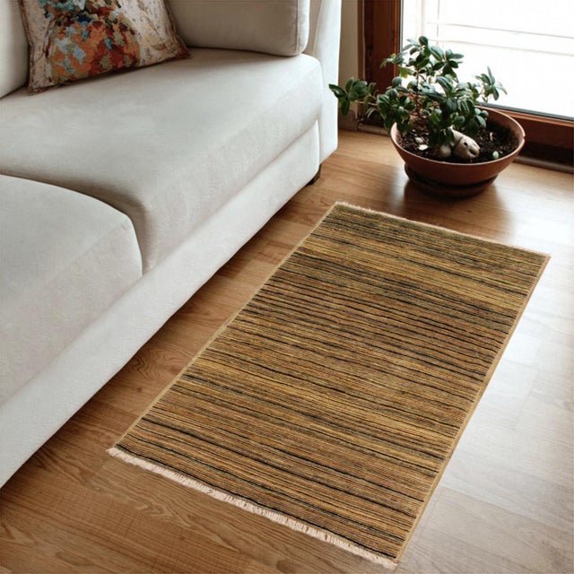 Transform your home's interior with a stunning hand-knotted Gabbeh rug. These rugs are meticulously crafted with bold...
