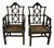 Vintage Chinoiserie Black Carved Wood Arm Chairs With Caned Seat - A Pair For Sale
