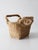 Vintage woven basket showcasing the beauty of natural materials and traditional handcrafted design. The rectangular form...