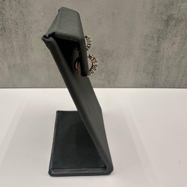 Contemporary Blue Topaz Huggies in 10kt Yellow Gold - 12 Topaz Stones, 12.2mm, 1.9g, New, A Pair For Sale - Image 3 of 5