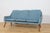 Three-seater sofa manufactured in Denmark in the 1960s. The sofa has oak armrests. The sofa has undergone a thorough...