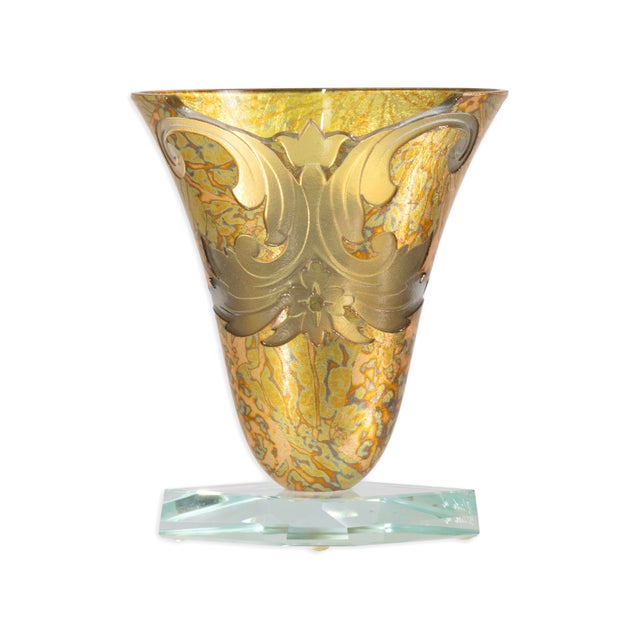A hand-blown studio art glass vessel by Salvatore Polizzi, dating to the 1990s and signed along the base. The piece...