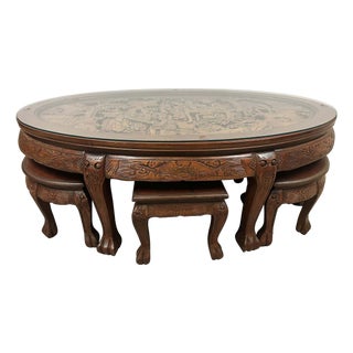 Mid-20th Century Chinese Massive Oval Carved Coffee Table With 6 Nesting Stools For Sale