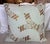 These pillows are crafted from hand-stenciled Nomi linen, featuring an intricate and symmetrical design in soft blue and...