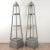 A pair of vintage, now gray, store display fixtures.