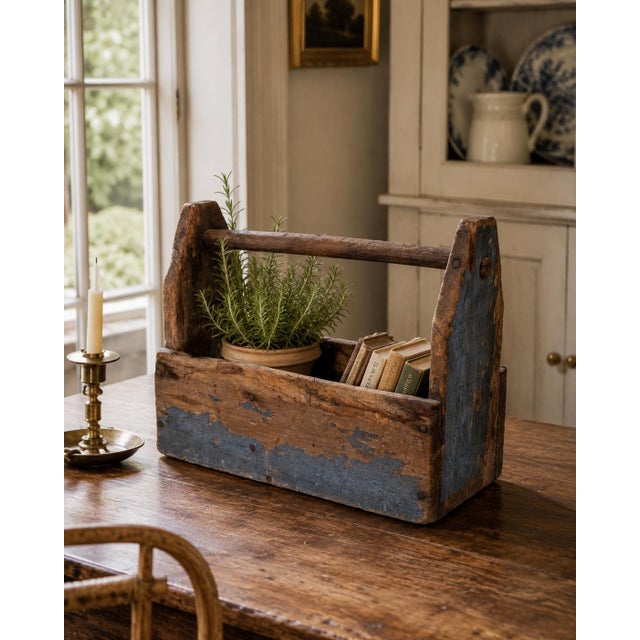 A wonderfully worn late 19th century pine trug or tool box with a tall fixed handle, central divider, and remnants of its...
