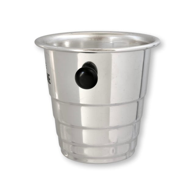 Crafted in heavy aluminum, this vintage French Champagne de Castellane bucket features a bold, sculptural silhouette...