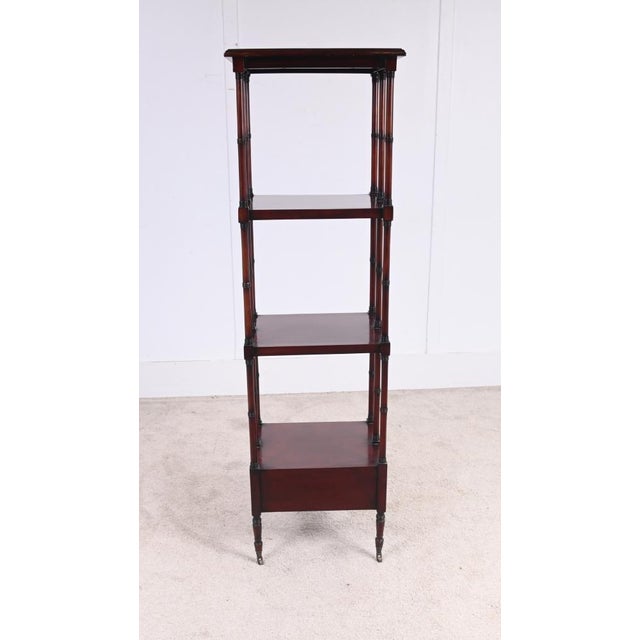 Elegant Georgian Style mahogany whatnot or open bookcase dating to circa 1900 Featuring four graduated tiers supported by...