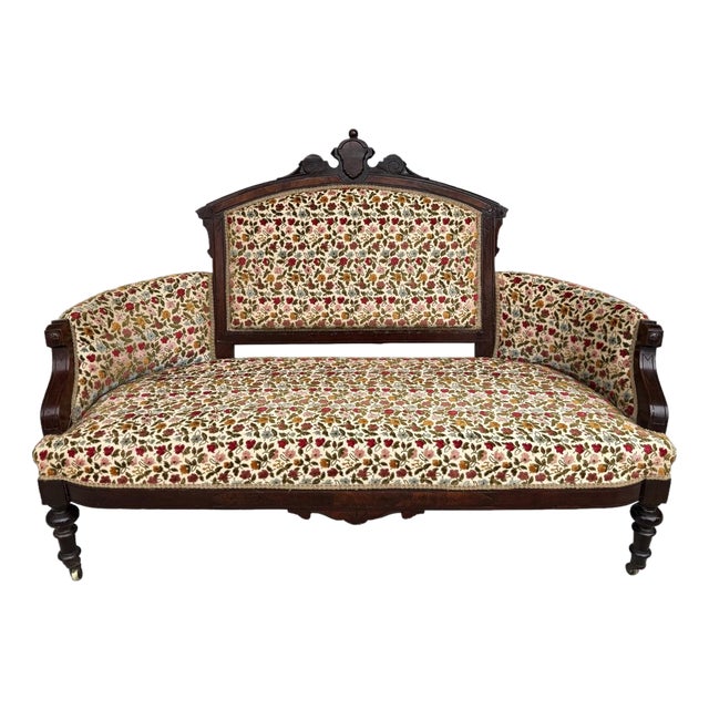 Antique Eastlake Walnut Settee With Floral Upholstery For Sale