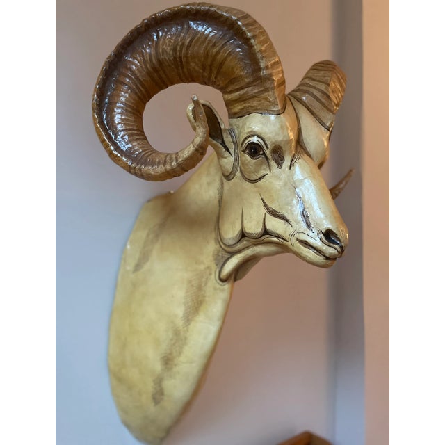 A stunning signed Sergio Bustamante painted Papier Mache ram's head sculpture, this life-sized piece is numbered 31/100.