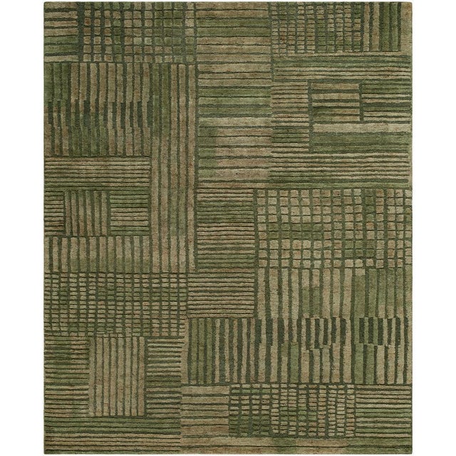 Introducing the Bergamo Collection's exquisite handmade rug, where minimalist modern design meets the luxurious texture of...