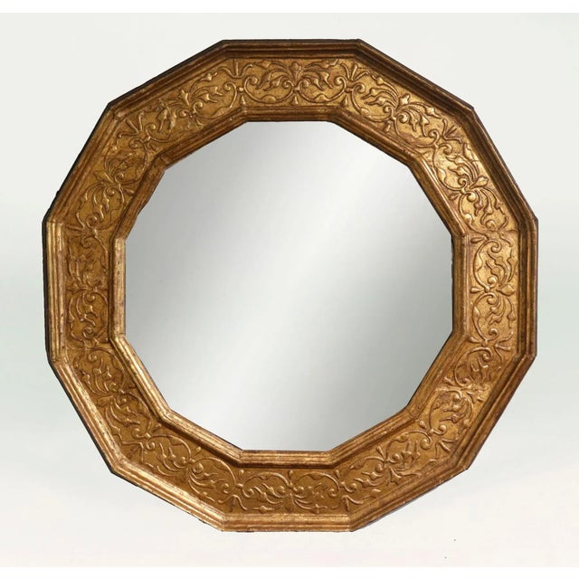 Early 18th Century very unusual Italian Baroque giltwood twelve-sided (dodecagon) mirror decorated with carved C-scrolls...