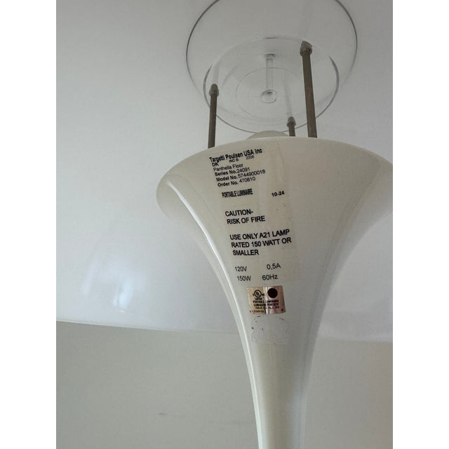 Iconic (and authenticated) Danish/modern floor lamp. Domed mushroom-shaped acrylic shade and laquered tulip pedastal base....