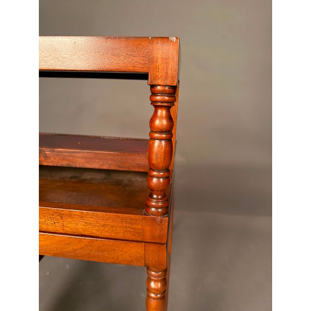 Set of custom flip-top English library steps that cleverly transform into a flat-top side table. Made of mahogany with...